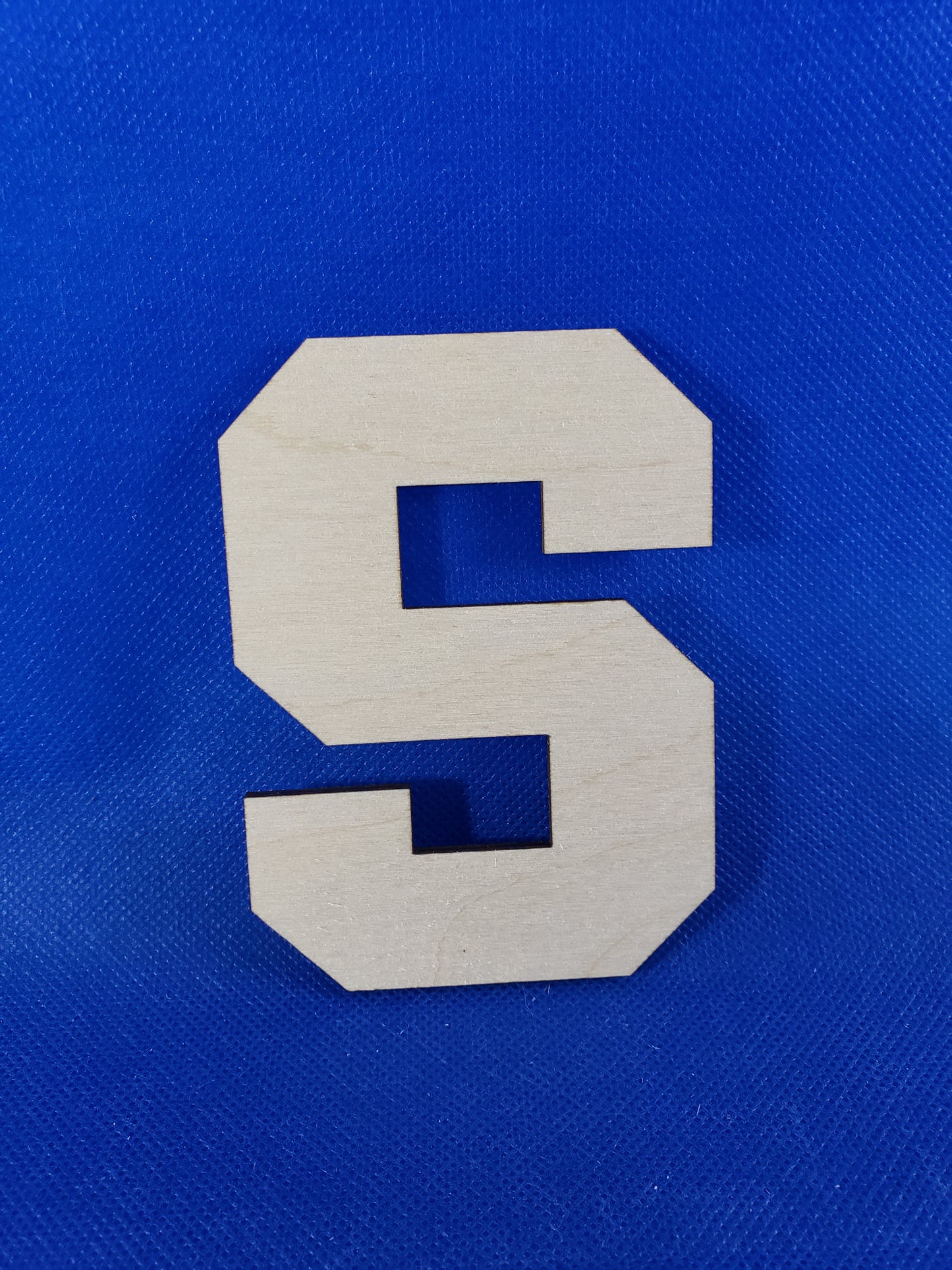 Syracuse University - Laser cut natural wooden blanks